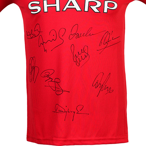 Roy Keane, Dwight Yorke, Gary Neville, Andy Cole, David Beckham, Ole Gunnar Solskjær, Paul Scholes, Peter Schmeichel & Ryan Giggs Signed 1999-2000 Manchester United Home Shirt (Front Signed)